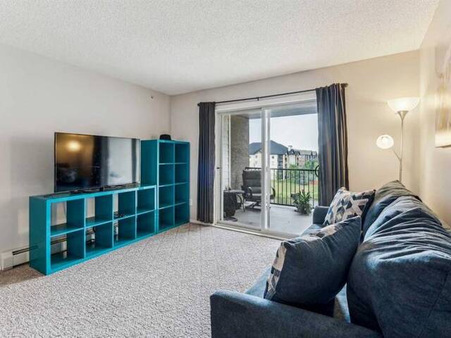 6408, 304 Mackenzie Way SW Airdrie